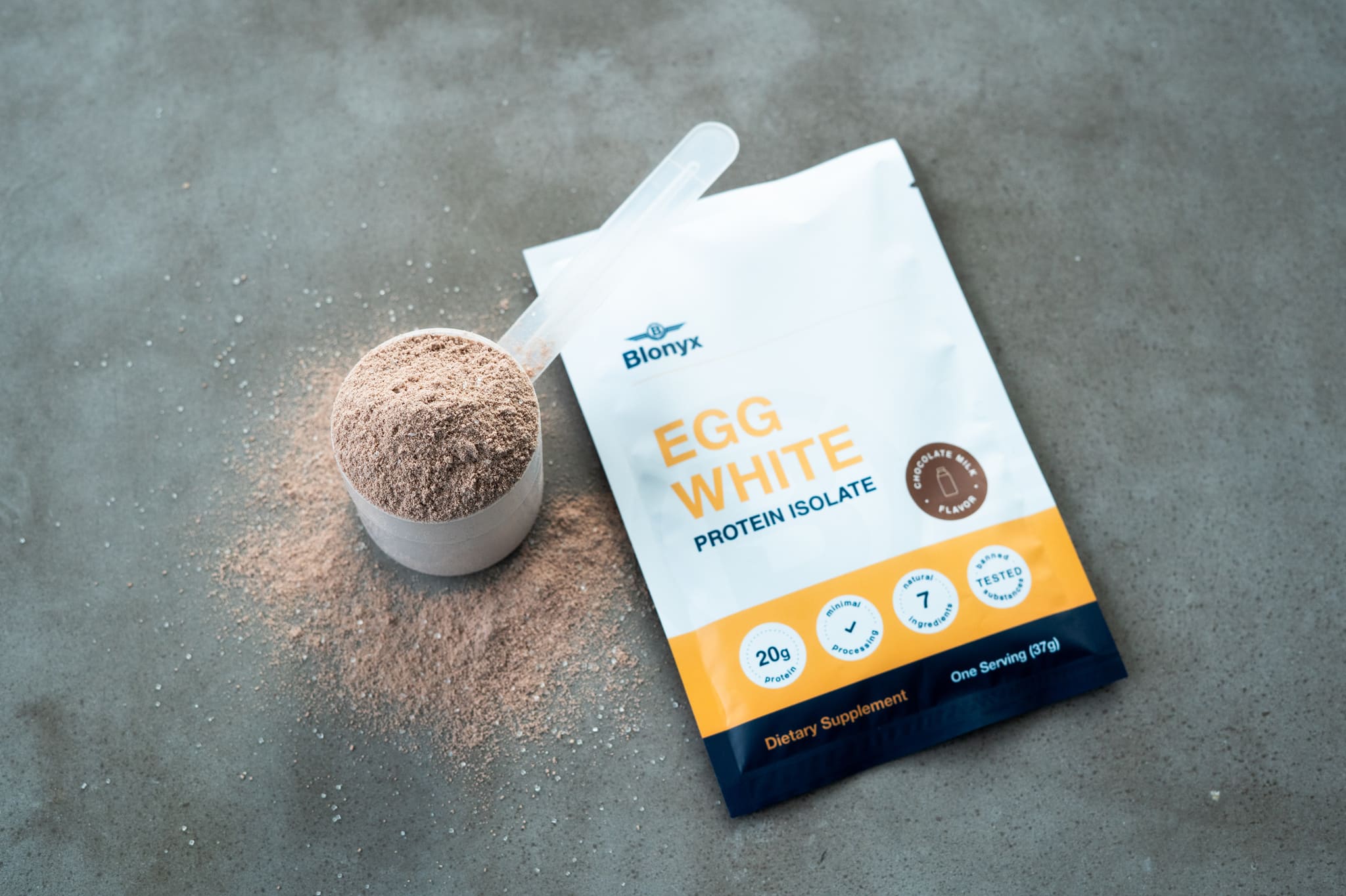 Blonyx Egg White Protein Single Serve on a Concrete Table