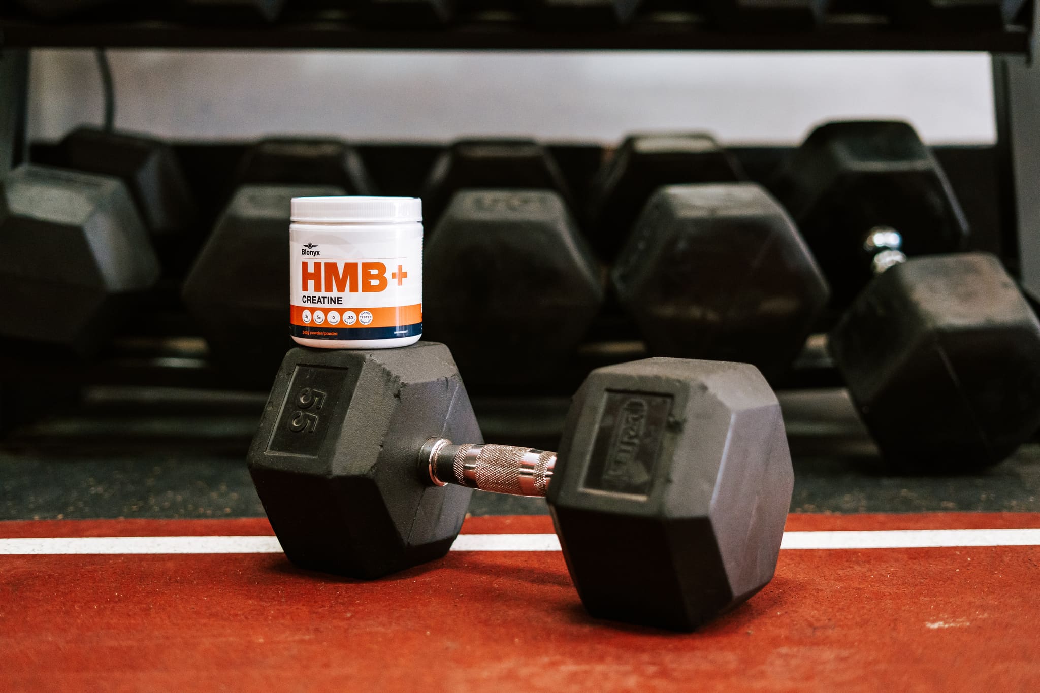 Blonyx HMB+ Creatine on a Dumbell