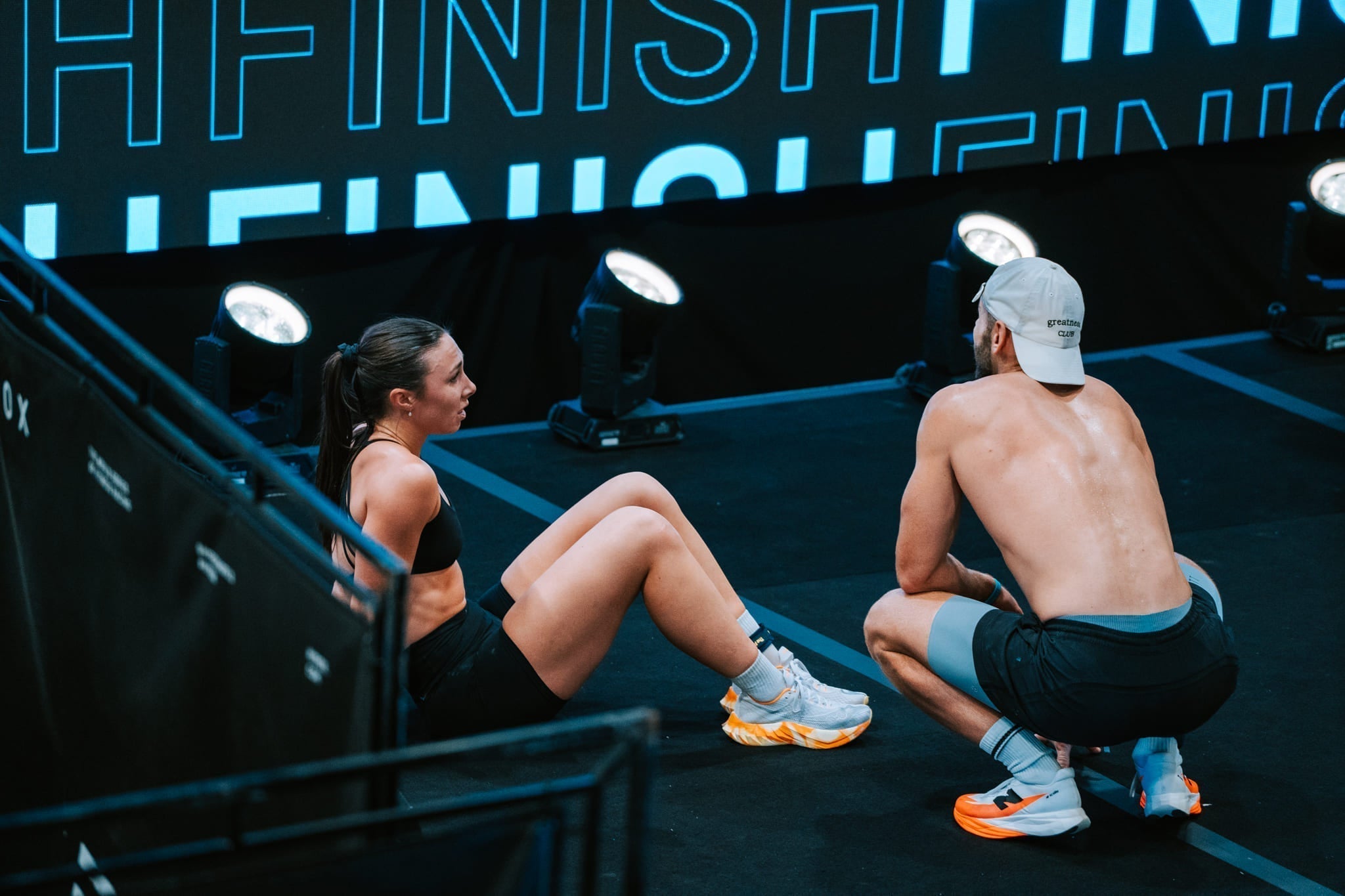 two exhausted HYROX athletes