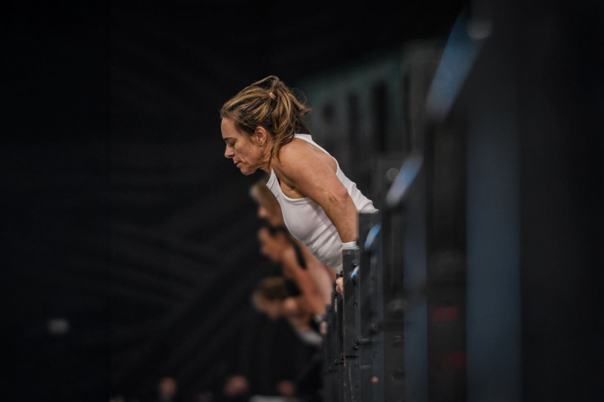 Jen performing a muscle up