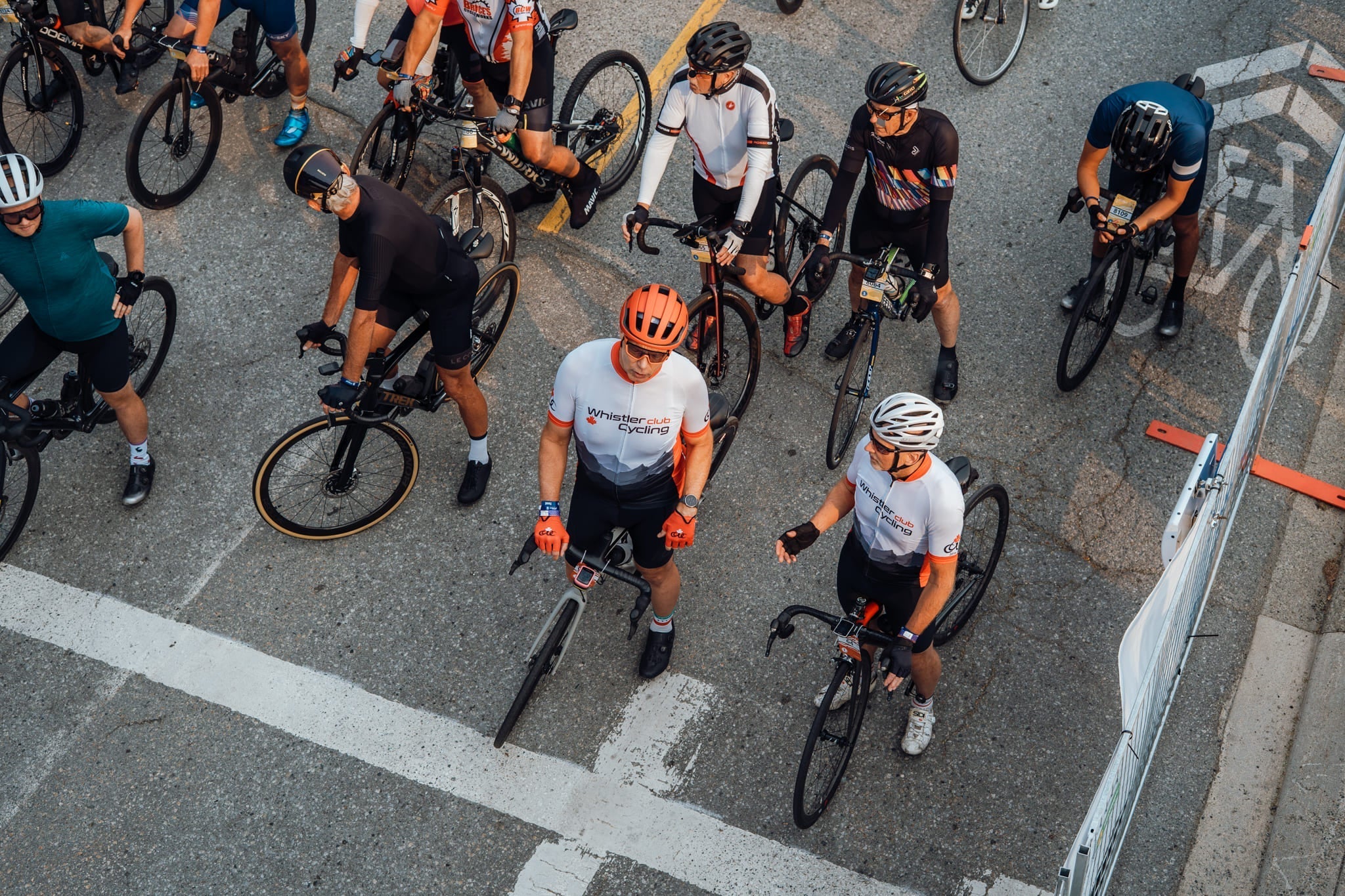 A group of cyclists line up for a race