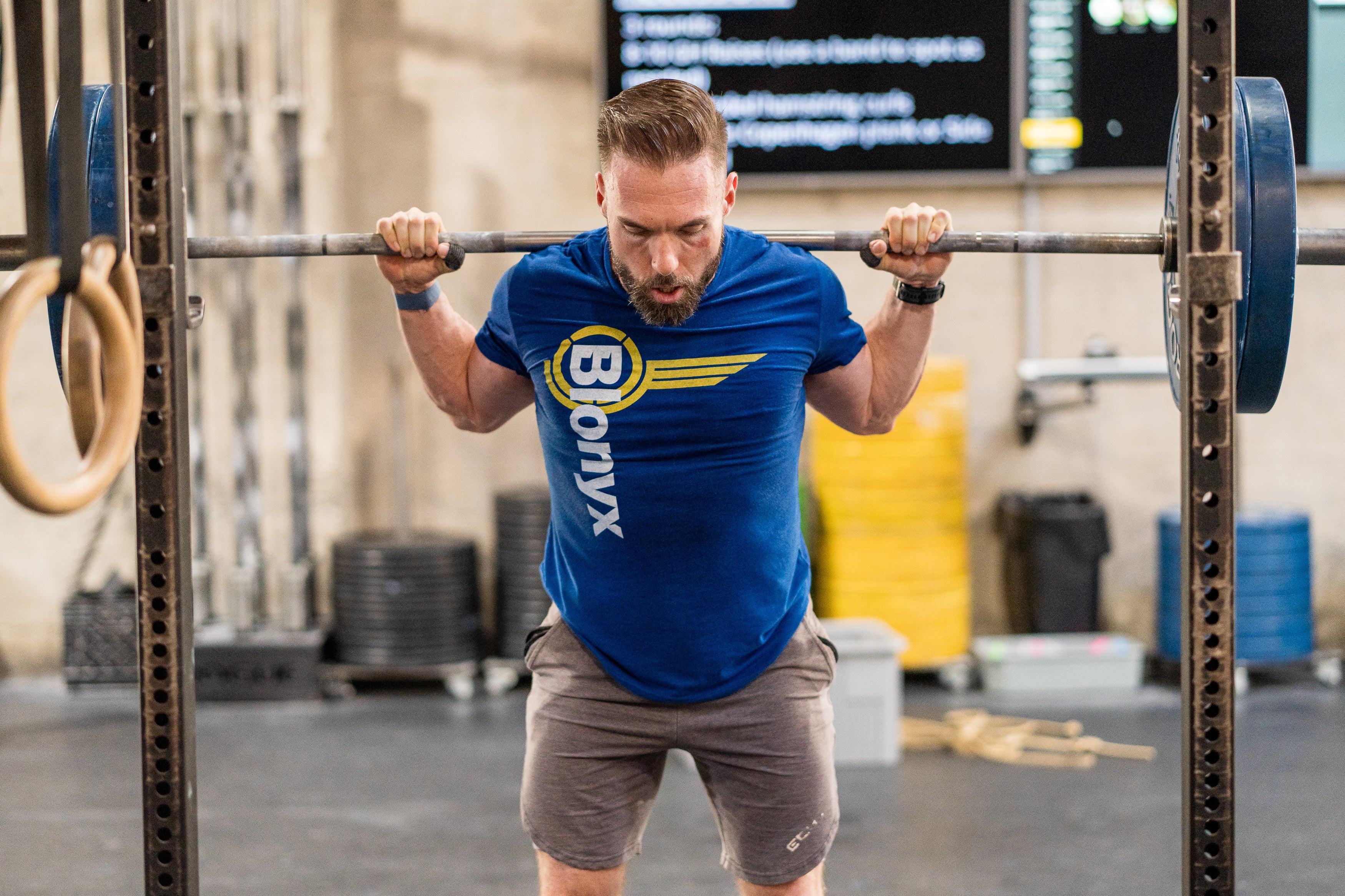 Man using a squat rack