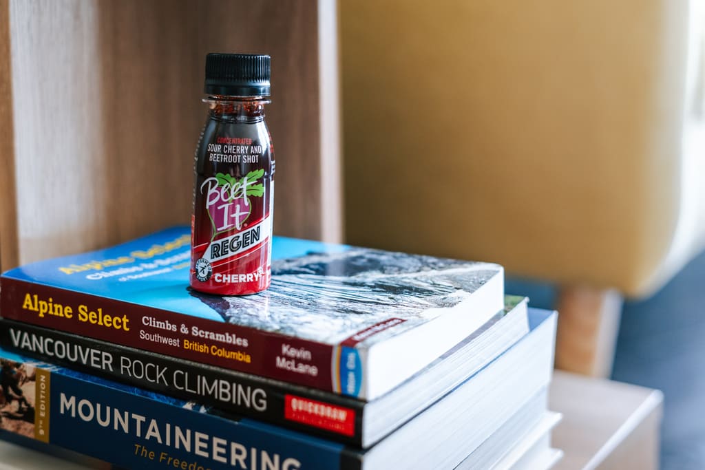 Tart Cherry Juice Shot On Mountaineering Books